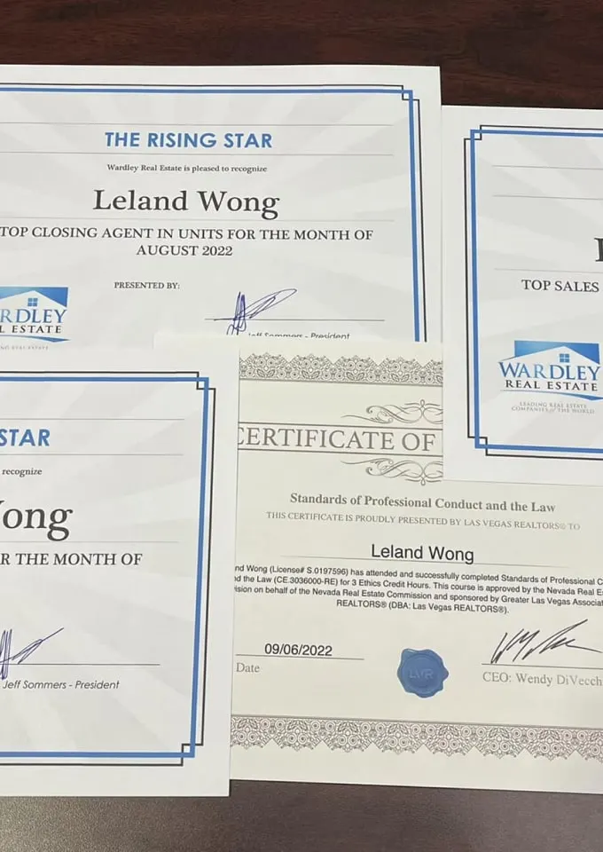 Rising Star award certificates presented to Leland Wong
